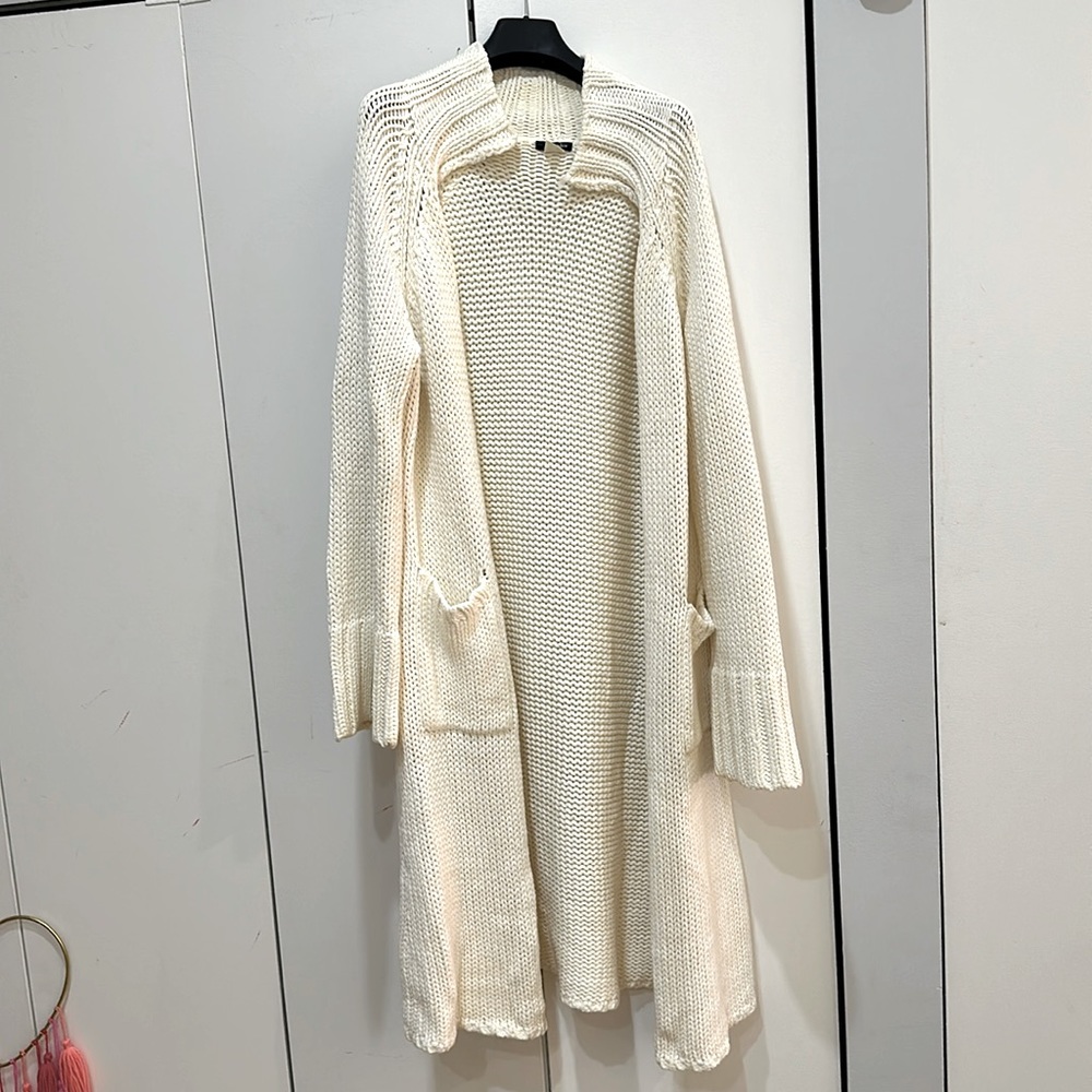 Cream duster sweater with front pockets